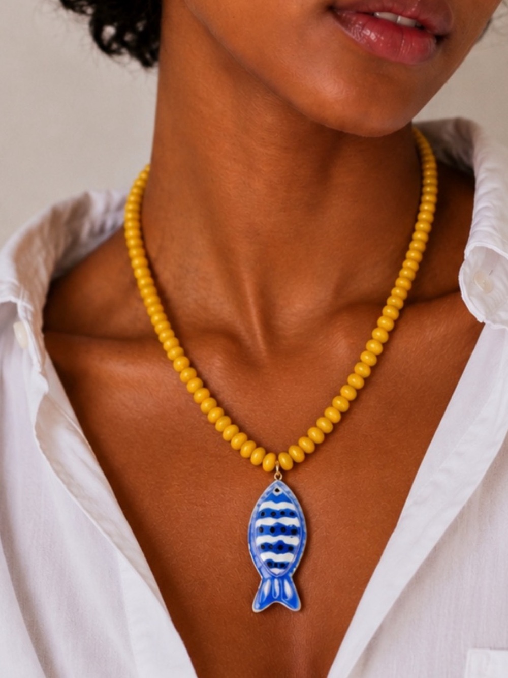 Coastal Yellow Beaded Necklace with Blue Fish Pendant